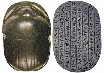 A carved stone heart scarab shown from above and from beneath, its underside covered in incised hieroglyphs