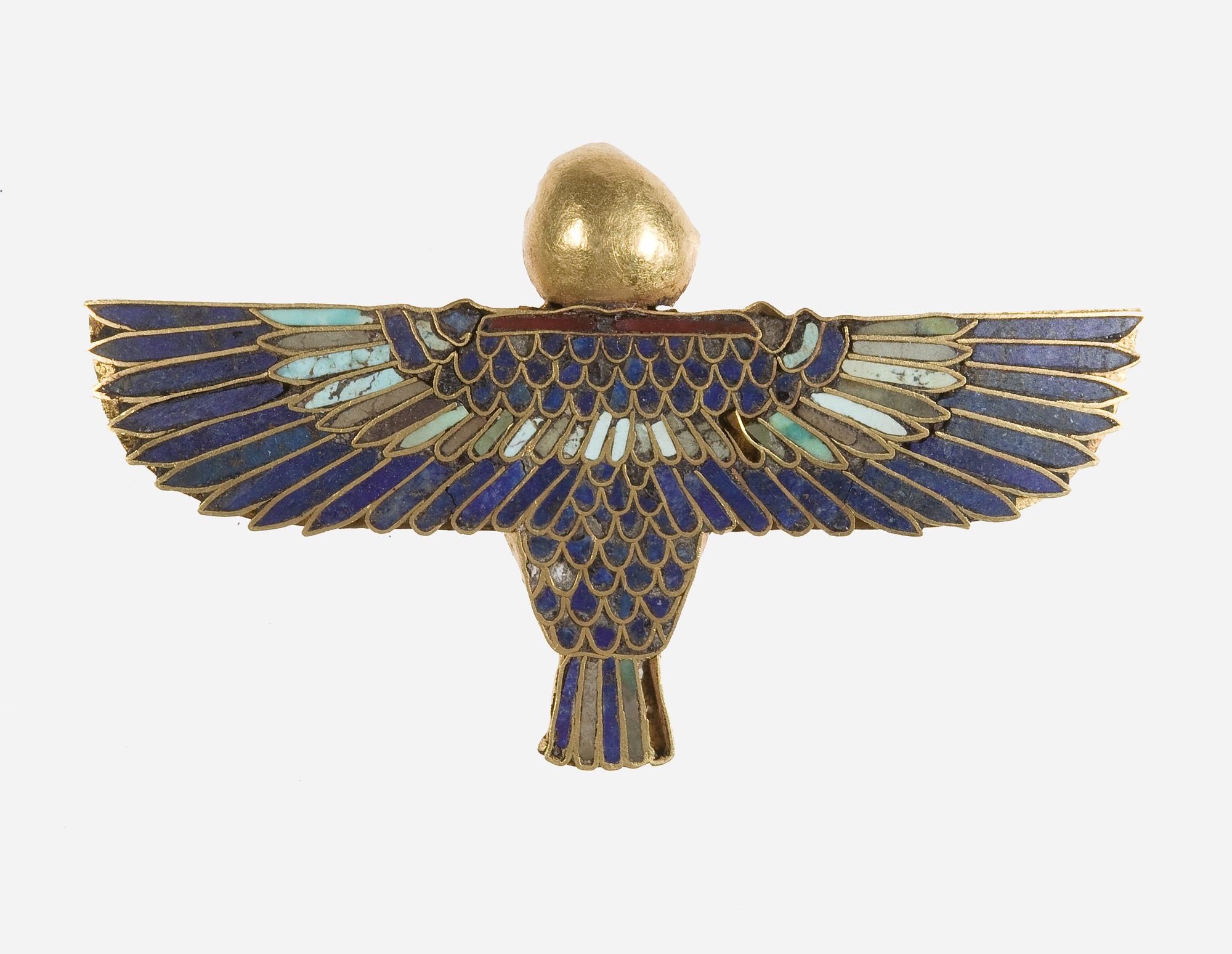A gold pectoral in the form of a bird with outstretched wings, the feathers inlaid in lapis and turquoise, a plain gold sun disc at its head