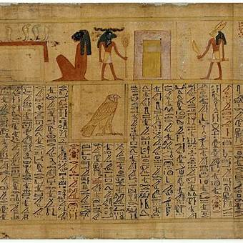 A Book of the Dead papyrus: a register of painted figures above — a jackal-headed god and a shrine — over columns of hieroglyphs framing a falcon